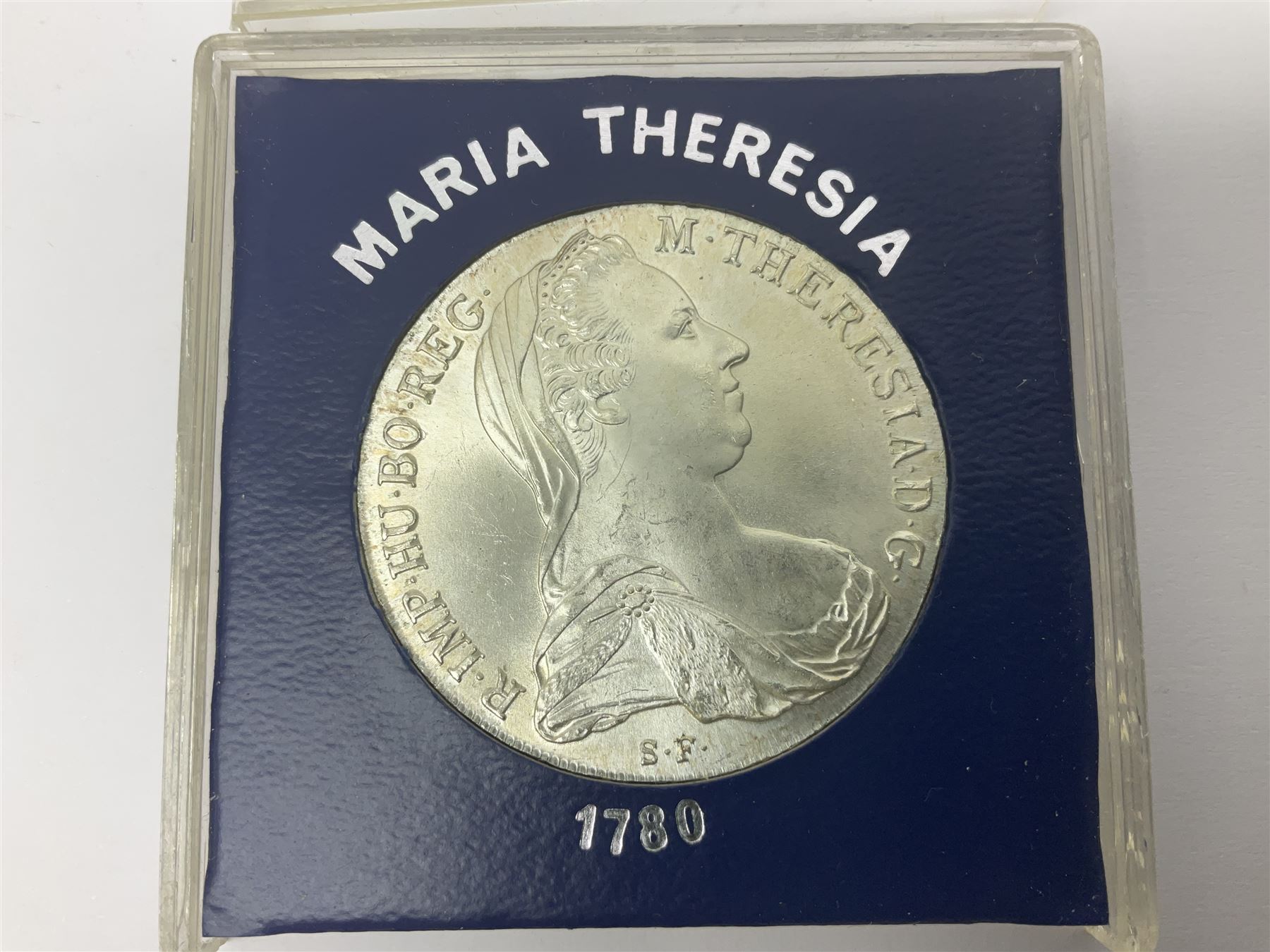 King George V British West Africa 1916 two shillings coin, King George VI Australia 1943 shilling, United States of America 1887 Morgan dollar, Bahrain 1968 500 fils silver coin, Maria Theresa restrike thaler and other coinage 