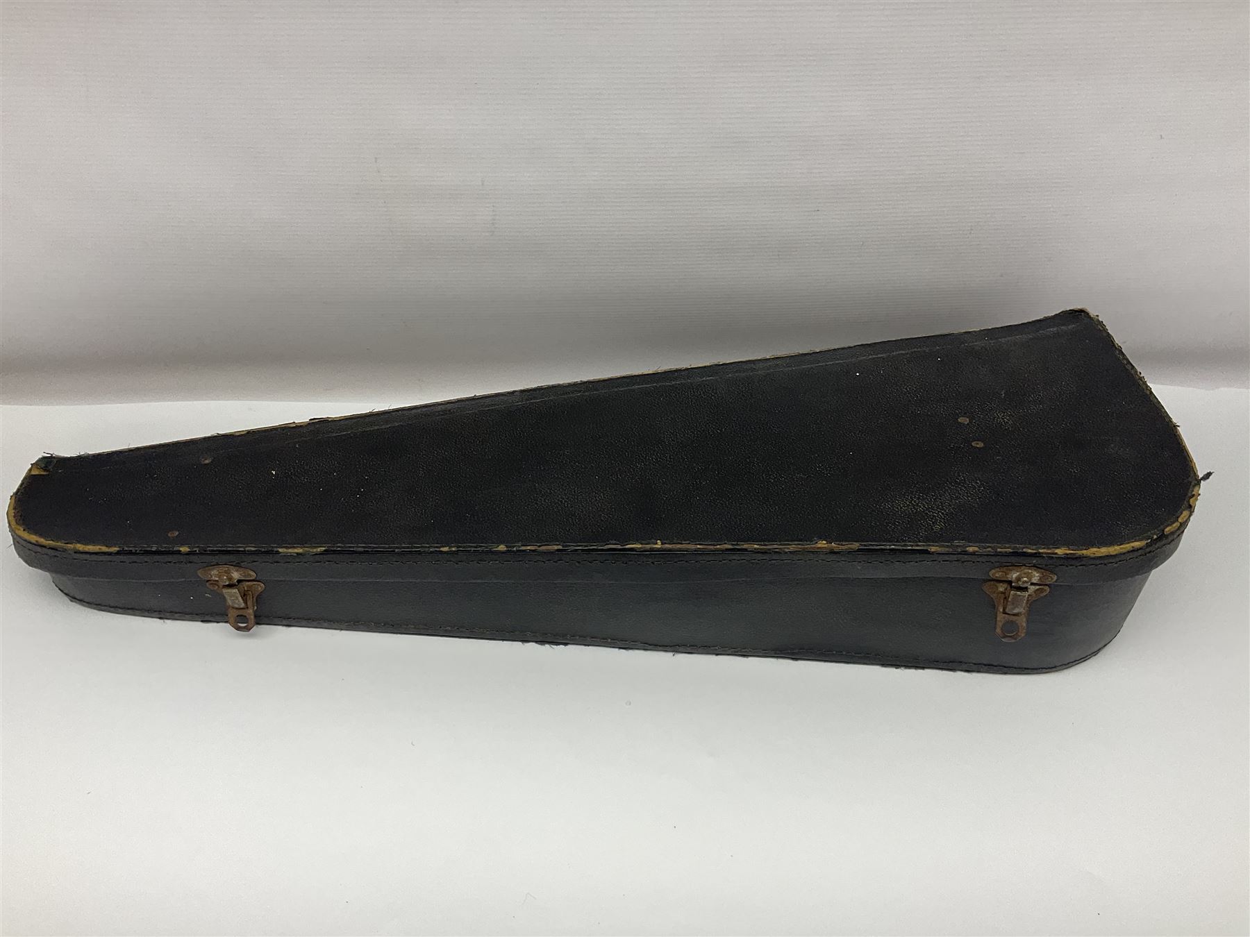 Late 19th century French three-quarter size 'Conservatory' violin with 34cm two-piece maple back and ribs and spruce top, the peg box inscribed 'Conservatory Violin Straduari', bears label 'Antonius Stradiuarius Cremonensis Faciebat Anno 1721' L55.5cm overall; in ebonised wooden 'coffin' case; and Saxony violin c1900 with 36cm two-piece maple back and ribs and spruce top; bears label 'Antonius Stradivarius Cremonensis Faciebat Anno 17**' L59cm overall; in carrying case (2)