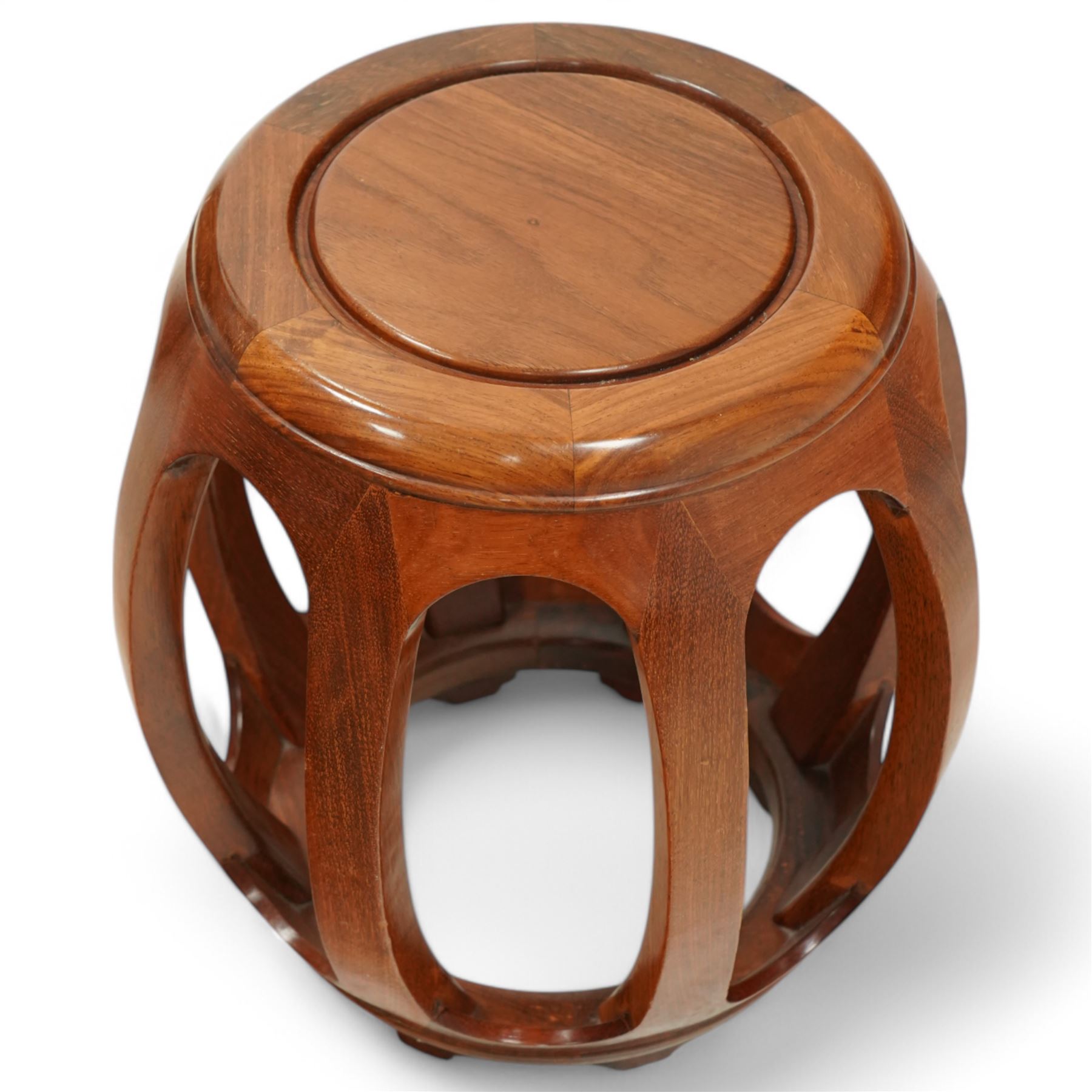 20th century Chinese hardwood drum-shaped stool or side table, circular top above shaped apron raised on eight curved scroll-decorated supports