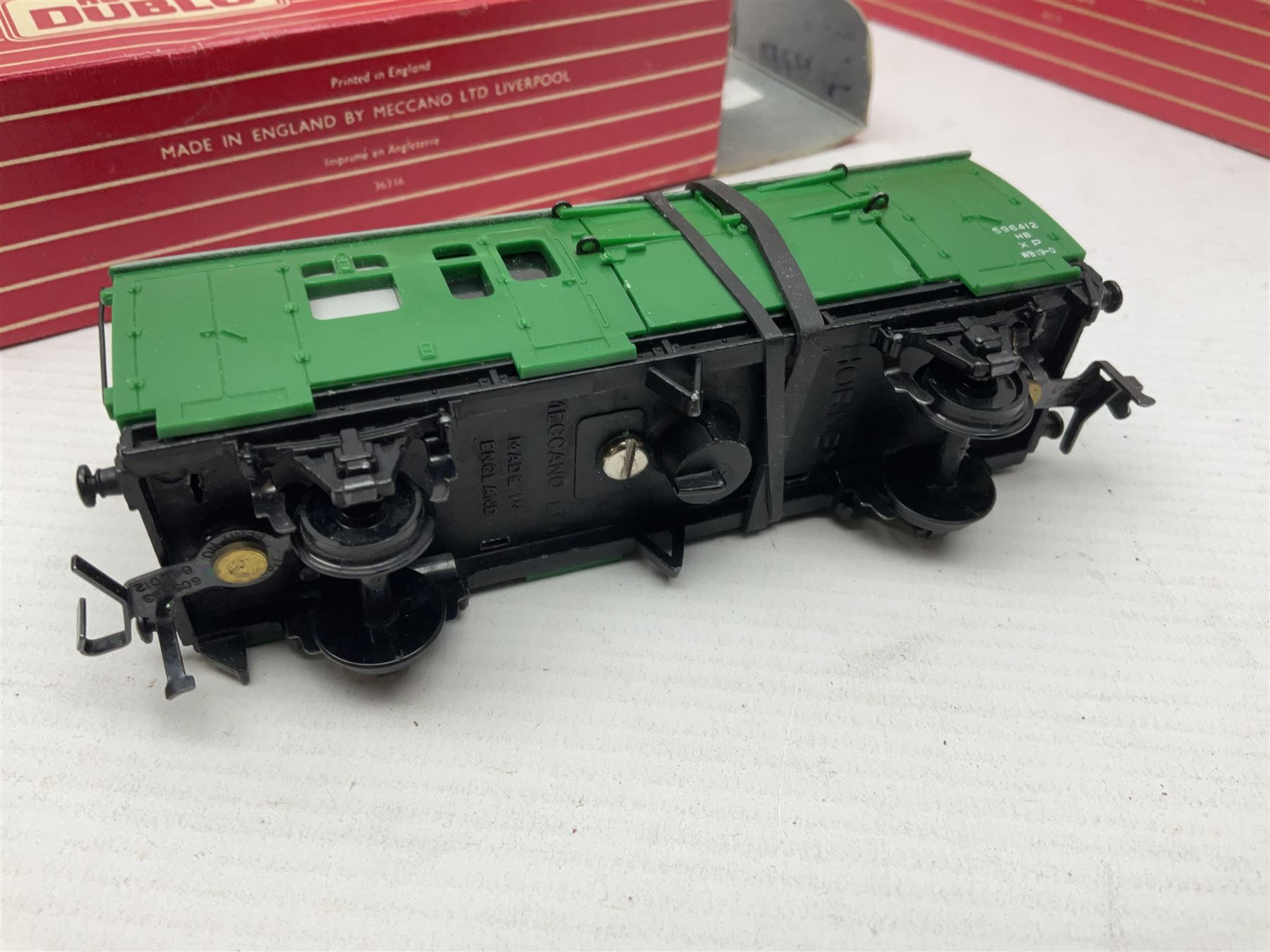 Hornby Dublo - sixteen goods wagons comprising 4644 21-Ton Hopper Wagon, 4315 Horse Box (BR) with horse, 4316 Horse Box (SR) with horse, 4649 Low Sided Wagon with tractor, 4301, 4310, 4311, 4312, 4313, 4320, 4626, 4648, 4652, 4675, 4678 and B550200 (Mineral Wagon); all in red boxes (16)