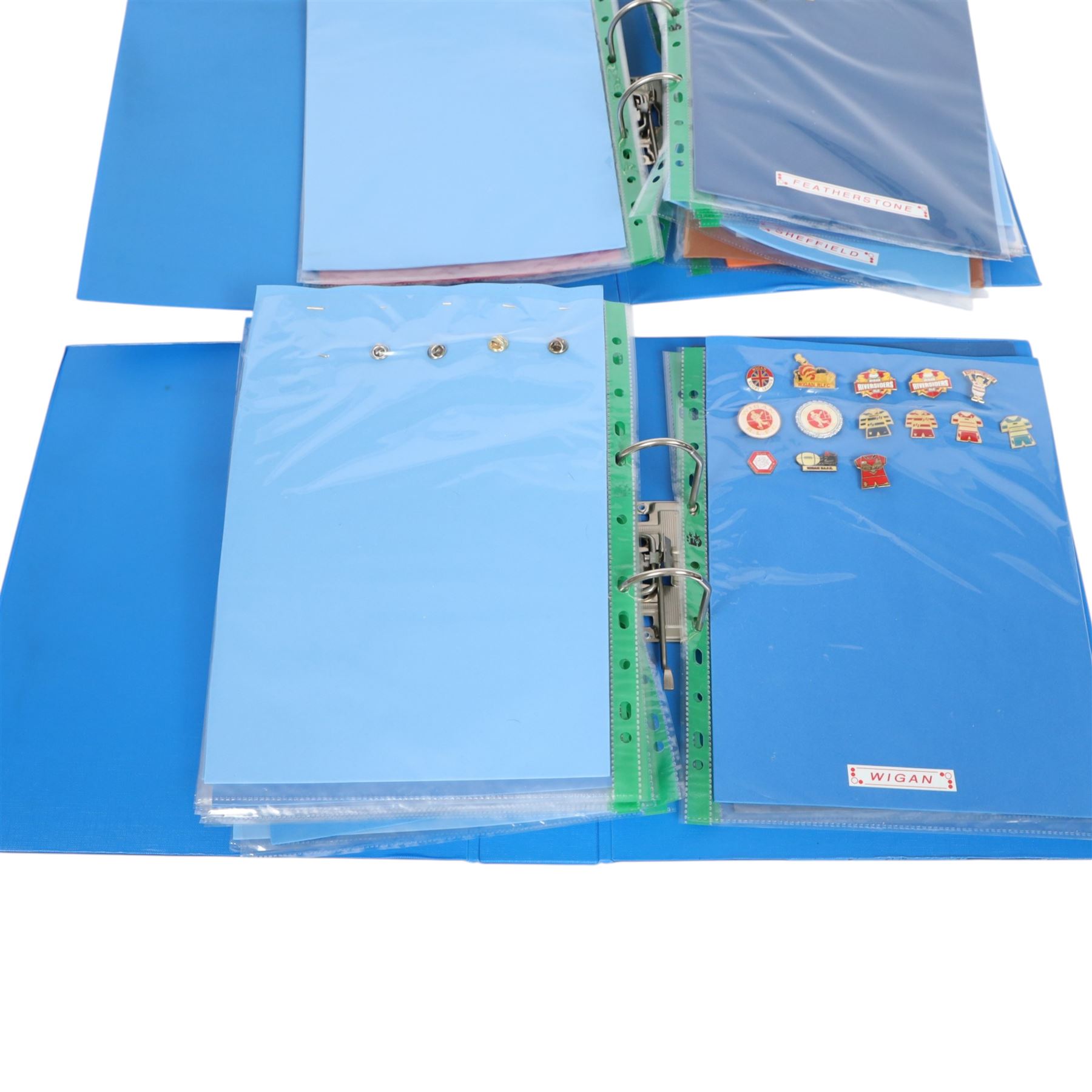 Rugby League club enamel badge collection, from teams including Bradford, Castleford, Huddersfield, Hull FC, Leeds, Leigh, St Helens, Salford, Wakefield, Wigan, York, Batley, Barrow, Bramely, Dewsbury, Featherstone, Halifax, Hunslet, Keighley, Oldham, Rochdale, Sheffield, Widnes, Workington, etc, all circa 2021, housed in two folders, (approximately 250)