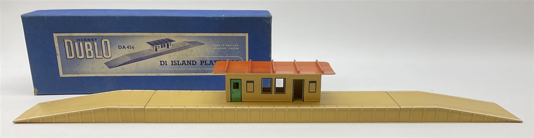 Hornby Dublo - six D1 accessories comprising Turntable; Through Station with separately boxed Platform Extension with Wall; Signal Cabin with orange roof and two packs of station names; Level Crossing; and Island Platform; all boxed (6)