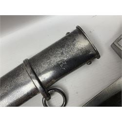 British 1796 Pattern Light Cavalry trooper's sword, the 84cm curving fullered blade stamped Hadley.1 to the back edge, steel hilt with knucklebow, D-shaped langets and leather grip; in polished steel scabbard stamped Osborn & Gunby Birmm. and W.R.16 ( ?16th Light Dragoons) with two suspension rings L100cm overall