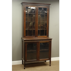  Edwardian mahogany display cabinet fitted with four glazed doors, blind fret work frieze and upright decoration, square taping supports with spade feet, W94cm, H201cm, D46  