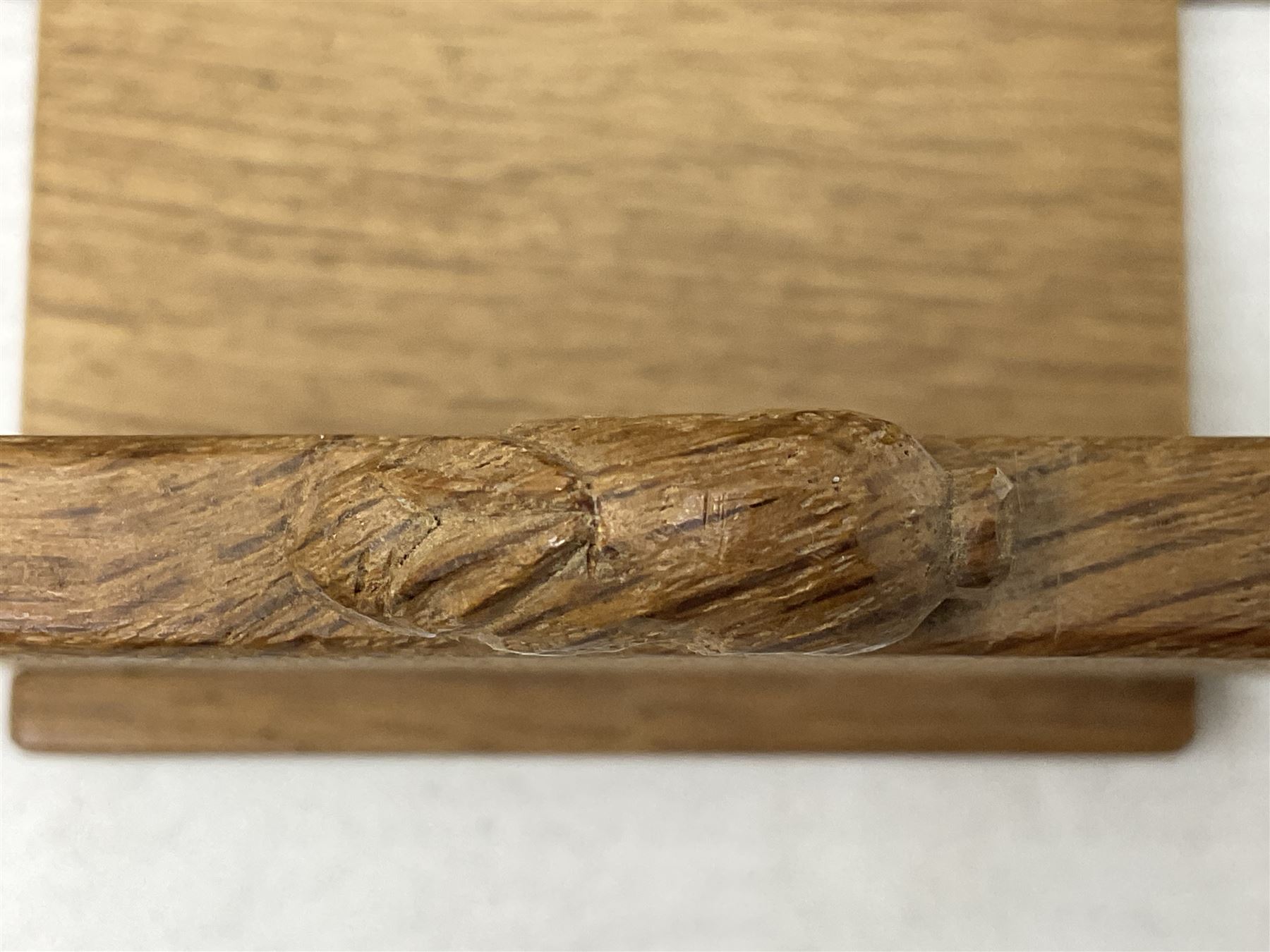 'Rabbitman' oak letter rack of two graduated square panels on a slab base, with carved with rabbit signature, by Peter Heap of Wetwang, H12cm