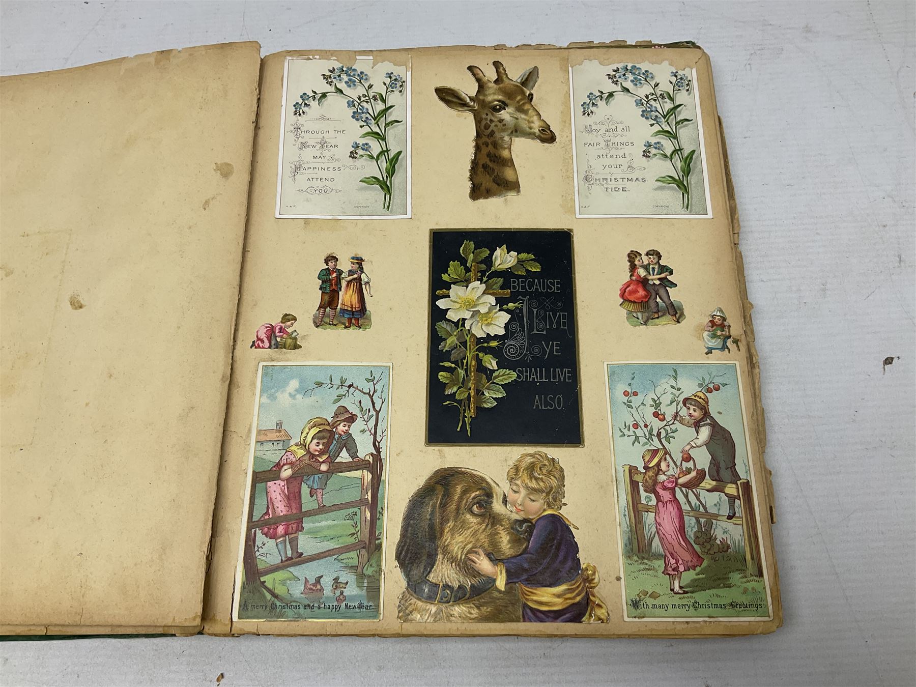 Victorian scrap album, well stocked with greeting cards and scraps; ten WW1 French embroidered silk postcards/greeting card including envelope type with greeting card insets; and large quantity of Edwardian and later postcards and greeting cards including maritime, Bonzo, greeting etc