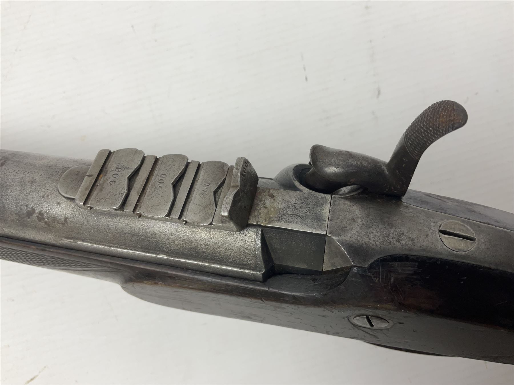 19th century George Gibbs of Bristol .461 cal. muzzle loading percussion match rifle with 28cm cut-down barrel and cut-down stock, Metford type rifling, fitted with additional three folding leaf rear sight to 400yds, back action sight still fitted to tang, maker's name to lock and top of barrel, serial no.439. L46.5cm overall
