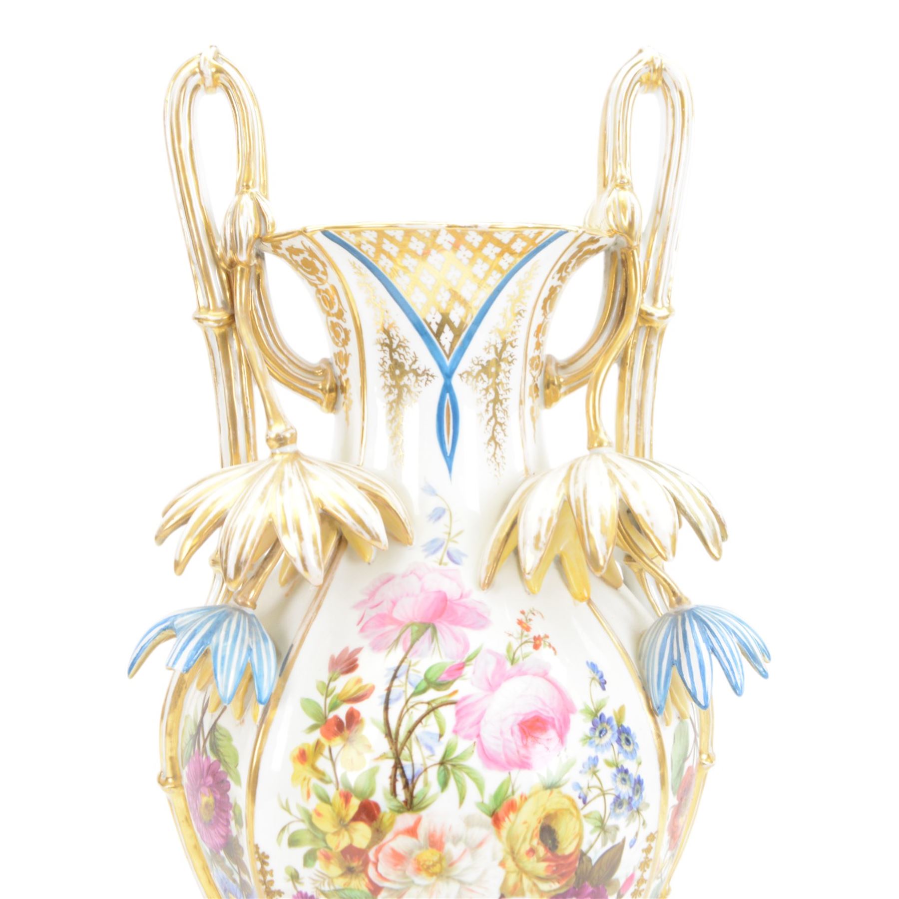 Large mid 19th century French porcelain vase, of baluster form with raised twin handles with applied stylised flower heads, the body painted with panels of pronounced floral sprays within blue and gilt borders, H58cm