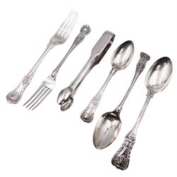 Group of Kings pattern silver flatware, comprising George IV dessert spoon, hallmarked Glasgow 1826, makers mark slightly worn and indistinct, a Victorian dessert fork and spoon, hallmarked Chawner & Co, London 1846, a William IV teaspoon, and an early 20th century dessert fork, together with a pair of George III silver sugar tongs, hallmarked Peter, Ann & William Bateman, London 1795, approximate total weight 9.33 ozt (290.1 grams)

