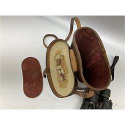Pair of WWII Barr and Stroud CF41 naval binoculars,  A.P.1900A, with painted broad yellow military arrows, engraved Barr & Stroud, 7X CF 41, Glasgow & London, Serial no. 62984 with leather lens covers and case, H24cm