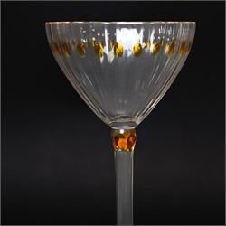 Otto Prutscher (1880-1949) - pair of early 20th century crystal wine glasses with citrine coloured ovals to the bowl and yellow stained at the top of the stem on a trumpet shape foot H21cm 
Notes: The glasses were probably made at the Meyr's Neffe glassworks, Adolf, Bohemia for the retailer E Bakalowits & Sohne, Vienna circa 1909