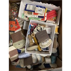 Quantity of sewing accessories to include buttons, cotton reels, Empisal Knitmaster wool winder, scissors, pins, sewing needles and other sewing aids in three boxes