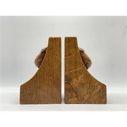 Pair 'Mouseman' tooled oak bookends, curved form and carved with mouse signature, by Robert Thompson of Kilburn