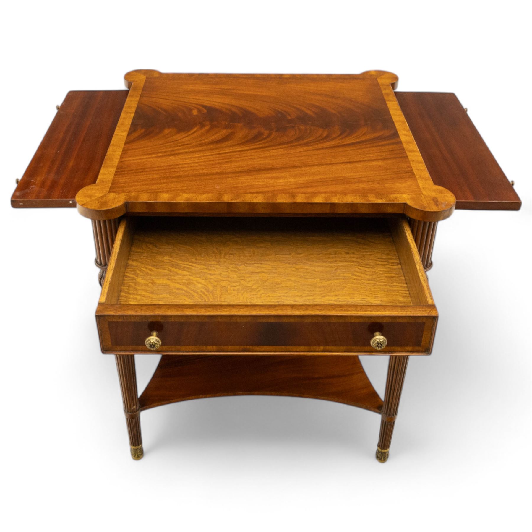 Maitland Smith - Pair of mahogany side tables, the rectangular top with rounded corners, the top edge inlaid with movingui wood, above two under-tier shelves, and frieze drawer, supported on stop-reed and acanthus foliate carved legs united by platform stretcher, raised on brass sabot foot caps