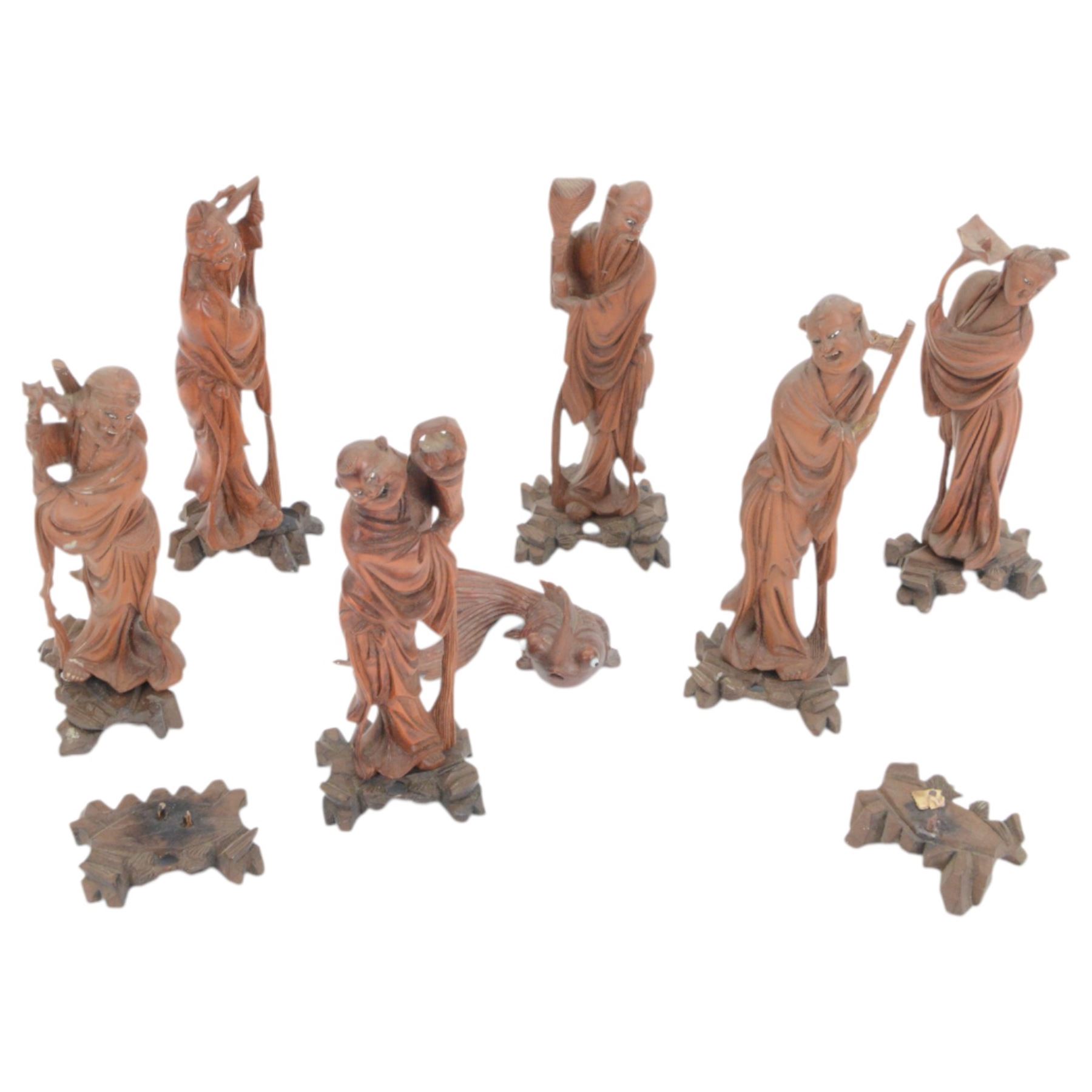 Collection of Chinese carving including a Shubunkin and various immortals 