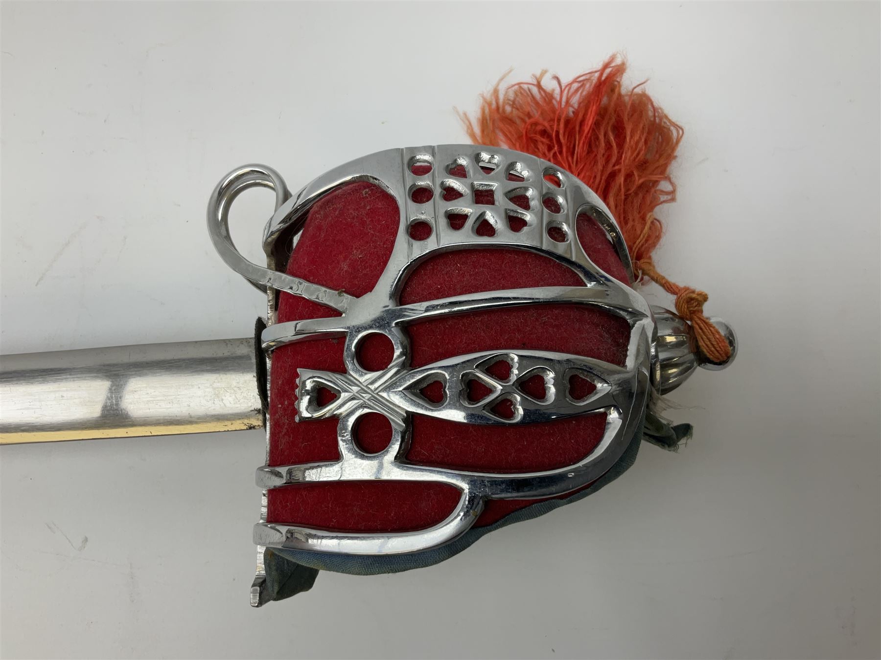 Reproduction Scottish basket hilted broadsword with 85cm double edged steel blade and red lined basket hilt with wire bound grip, in white metal mounted leather scabbard 107cm overall