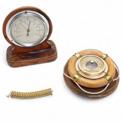 Mid 20th century barometer in the form, D12.5cm of a lifebuoy and one other; together with...