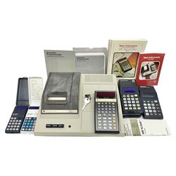 Four 1970s Sinclair electronic calculators - Cambridge in hard case with booklet; Scientific Programmable with Program Library and booklet; Scientific in hard case; and Oxford 300 in soft case with booklet; together with Texas PC-100 SR56 programmable slide-rule calculator on base station with readout, two booklets, keys and cover, serial no.9103093