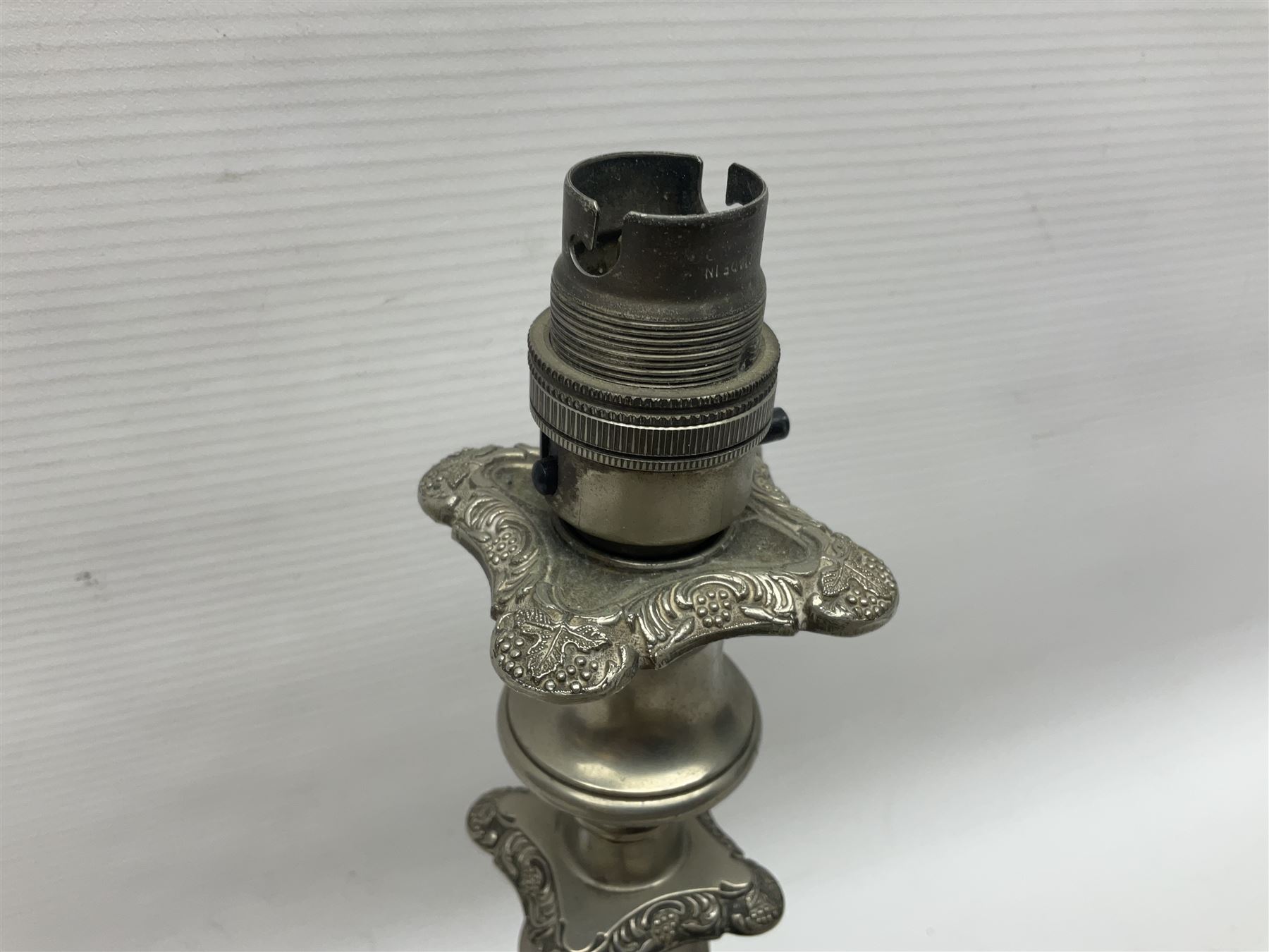 Pair of Corinthian column candlesticks, and a silver plated lamp, candlesticks H26cm