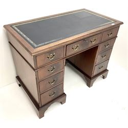 Early 20th century mahogany twin pedestal desk, inset leather top, nine drawers, nine drawers, bracket supports 