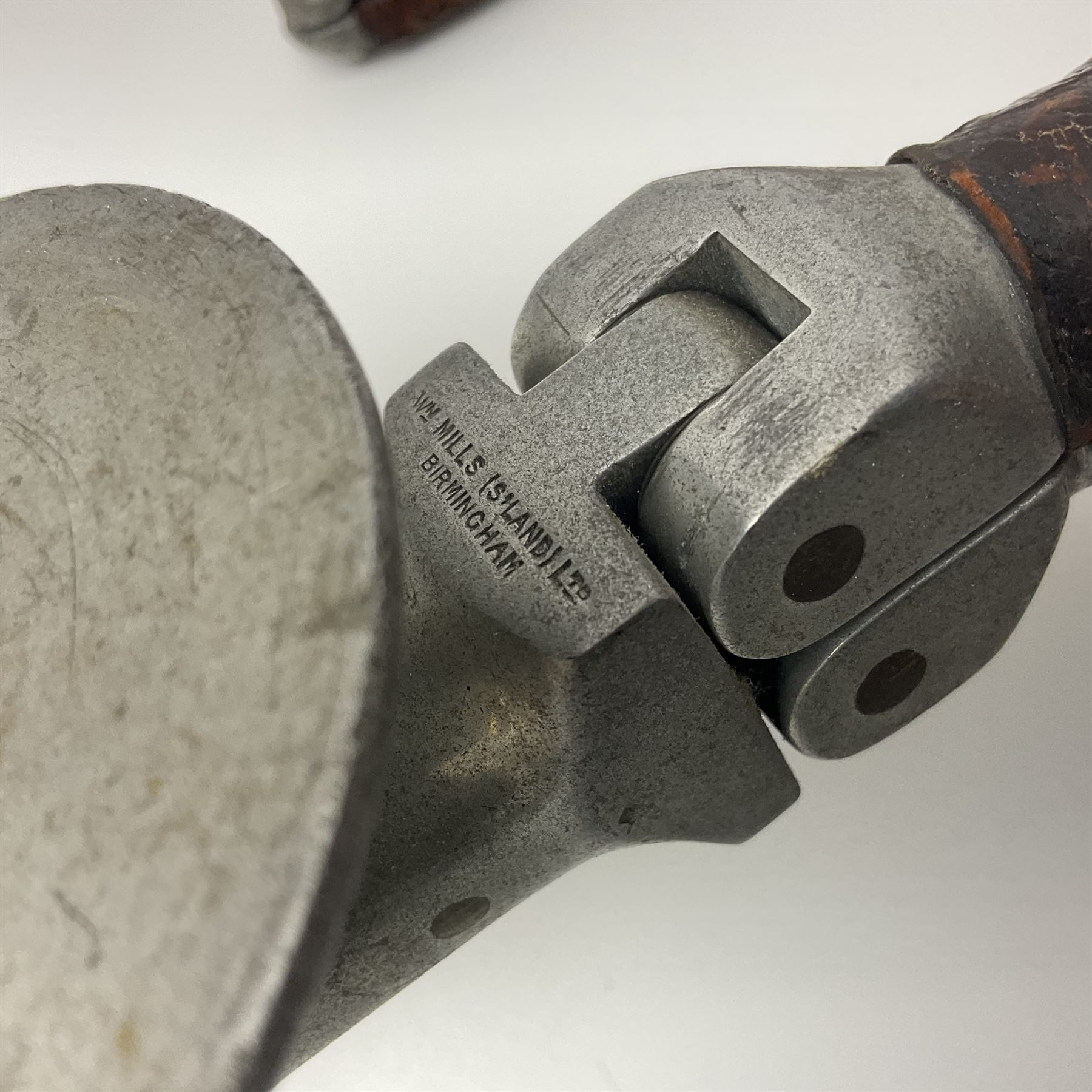 Early 20th century curved horn handle walking stick with hallmarked silver mounts, engraved L Russell 1918, together with a shooting stick by William Mills Birmingham, with leather handle, 'The Featherwaite' shooting stick and an umbrella with wooden handle