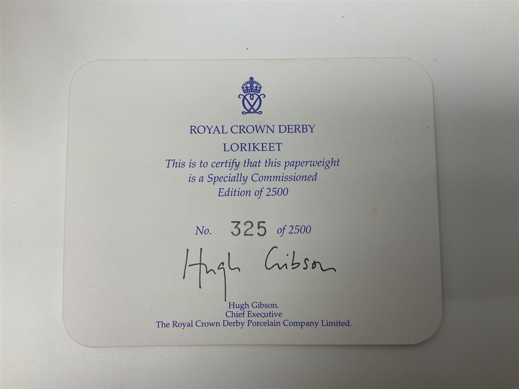 Royal Crown Derby paperweight, Lorikeet, limited edition 325/2500, with gold stopper and printed mark beneath, with certificate and original box