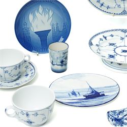 Royal Copenhagen onion pattern low comport, three breakfast cups and five saucers, oval platter, four tea plates, Munich 1972 Olympics plate, and four other blue and white items