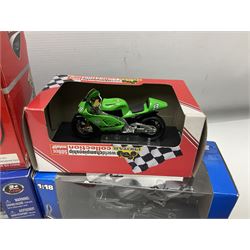 Fifty-one die-cast models of motorcycles by Maisto, Protar Italeri, Welly etc; many in perspex display boxes, some in window boxes and some unboxed