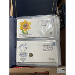 Approximately one hundred and fifteen Royal Mint coin covers, in two ring binder folders and loose, together with approximately 53 grams of Great British pre-1920 and approximately 68 grams of Great British pre-1947 silver threepence coins, and a small quantity of further pre-decimal coins