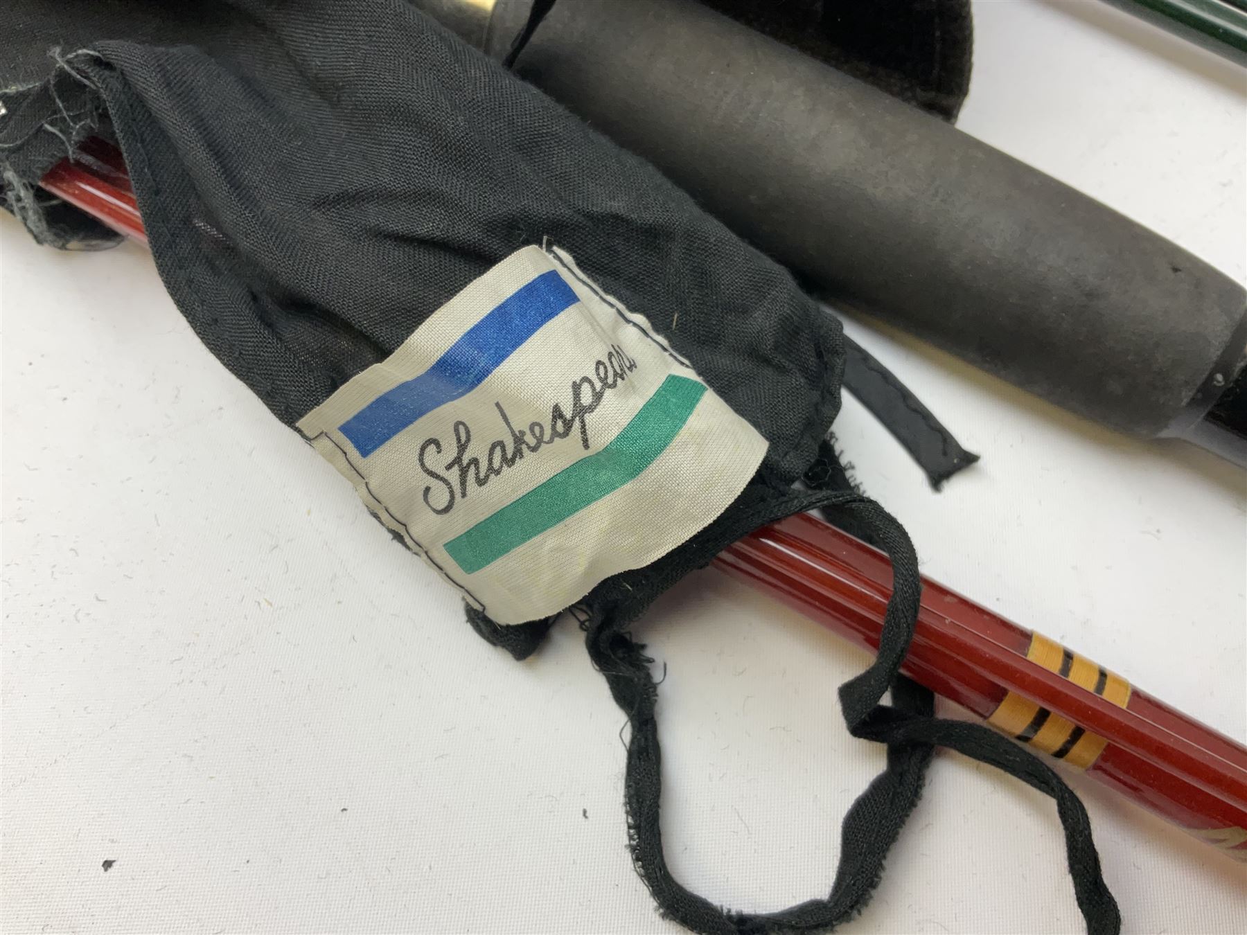 Quantity of fly and sea fishing rods and accessories, to include Shakespeare Boat 210 rod, Daiwa rod and others, and Guang Zhao FLD9000 course fishing reel, Beachmaster 7000FD, Rimfly II amd Penn Super Mariner, tackle etc