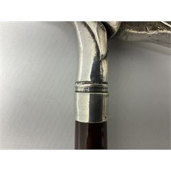 Art Deco style Italian 'Rivestito' covered silver walking stick handle, modelled in the form of a swan, stamped 'R', upon a silver collar hallmarked Birmingham 1986, makers mark DH-L, and hardwood shaft, L96cm

Provenance by vendor repute: 
This walking cane comes from a private collection amassed by the current vendors mother who was an Antique dealer specialising in walking sticks, working at the Portobello Road Antique Market in London for over forty years. 
In 1988 the prop crew from LWT (now ITV) visited Portobello Road looking for, amongst other items, a signature stick for David Suchet to use in his portrayal of Agatha Christie's Poirot. 
At the time this particular walking stick was one of five in possession. The prop crew chose and purchased another of the five which was then used by Suchet throughout all seventy episodes of the much loved series. 
Following the conclusion of the series Suchet was gifted his particular cane, which has been loaned to and can now be seen at the Agatha Christie Gallery at the Torquay Museum. 
