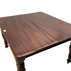 19th century mahogany extending dining table with three additional leaves, rectangular top with rounded corners, pull-out action, on turned and faceted supports with brass castors