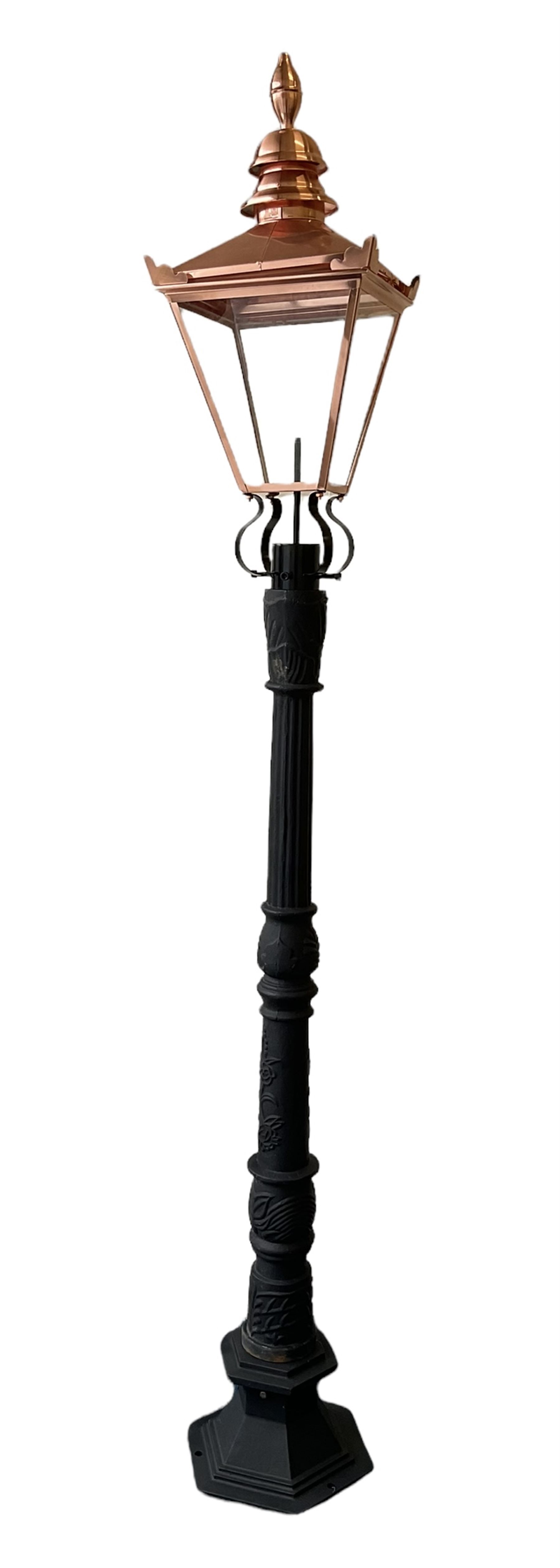 Victorian style cast iron street lamp post, with copper and glass lantern top