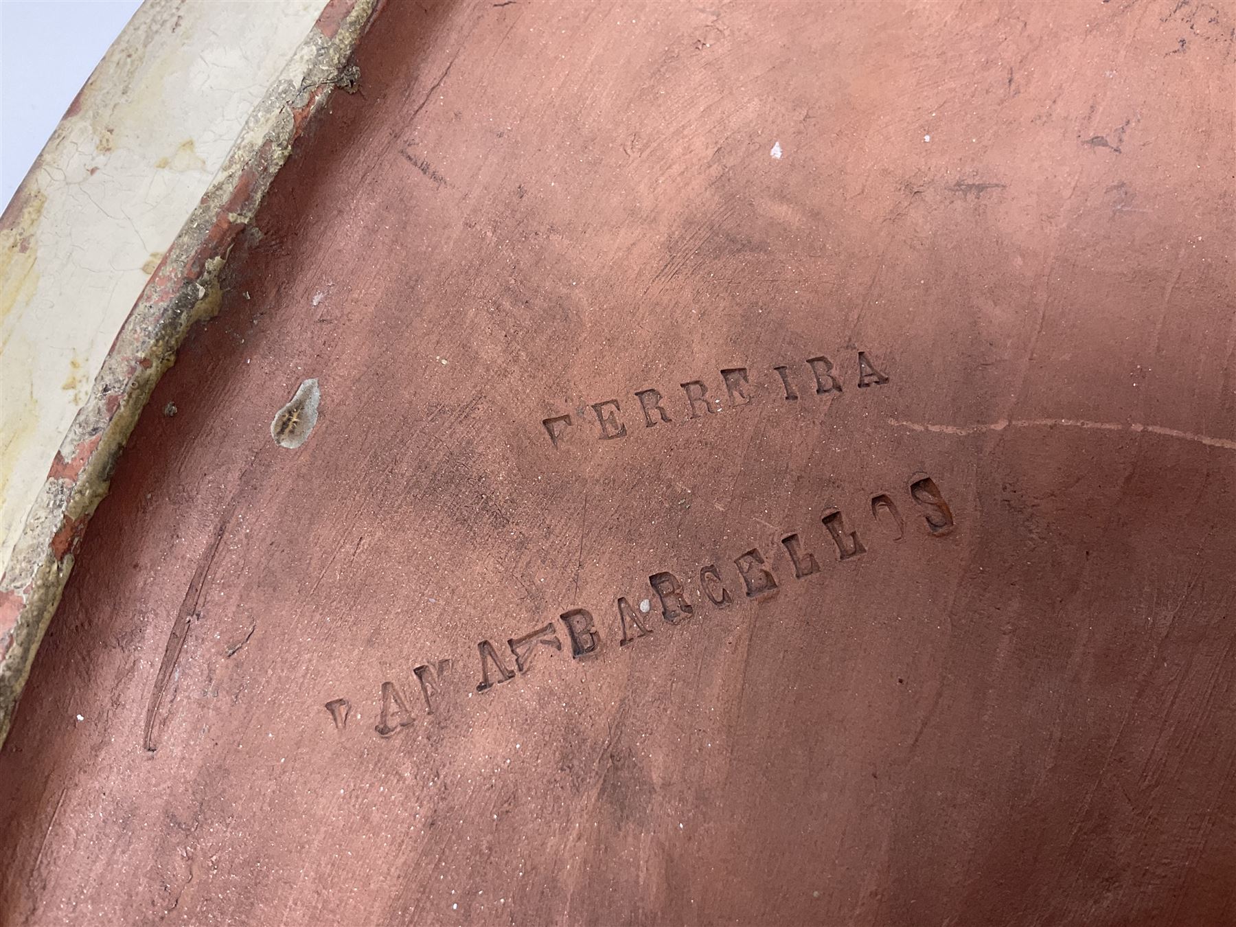 Pair of 19th century classical terracotta relief wall plaques depicting the goddess Hygeia and another goddess, seated holding an ewer, each of oval form, indistinctly signed, each stamped Ferreira verso, H42cm, W30cm