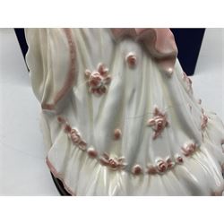 Three Royal Worcester figures, comprising Glyndebourne, with original box, Royal Worcester Special Even 1998 Elizabeth, with certificate and original box, and In Celebration of the Queens 80th Birthday 2006 