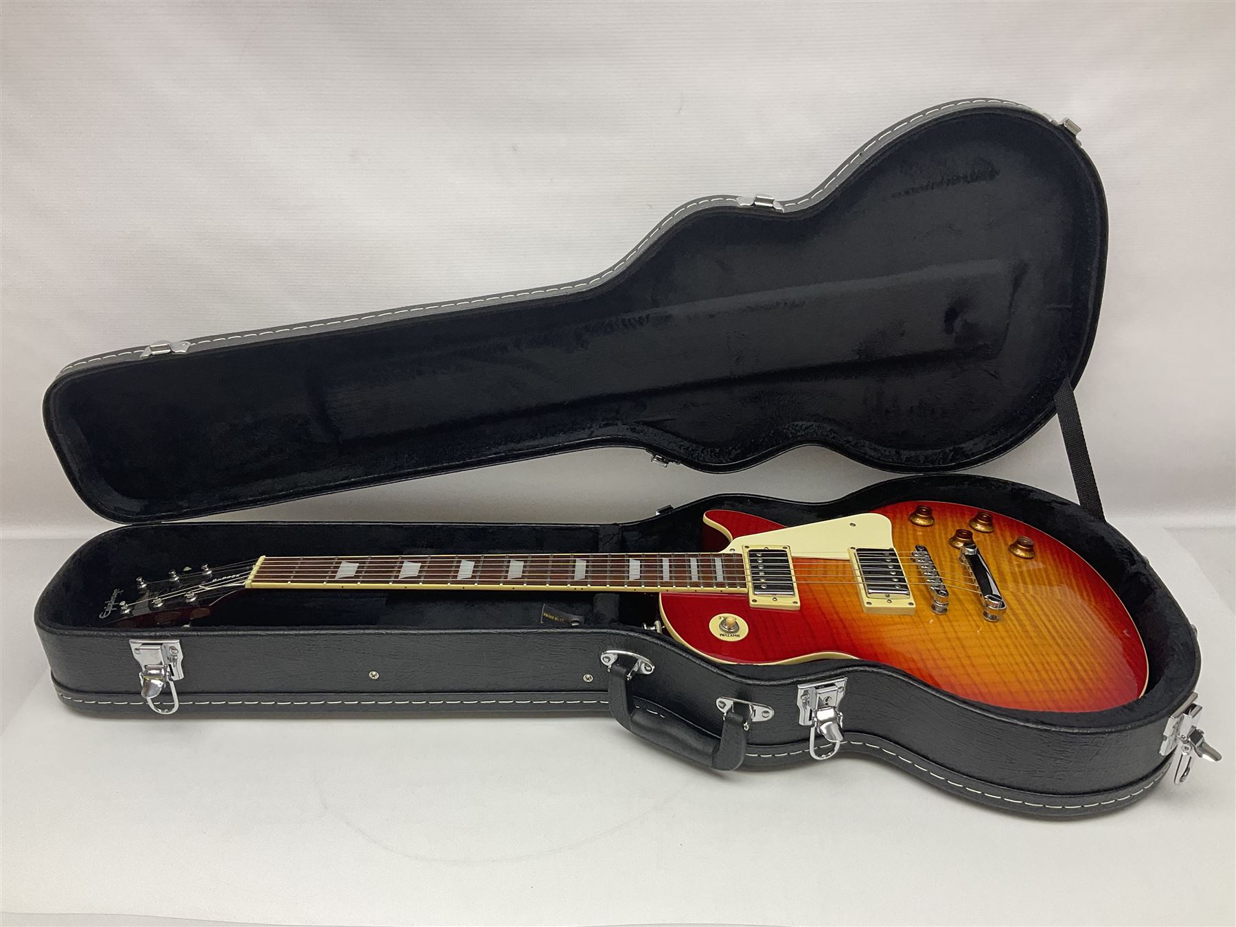 Epiphone Les Paul Gibson electric guitar in two-tone red sunburst finish, serial no.SO1113016, L101cm overall; in hard carrying case