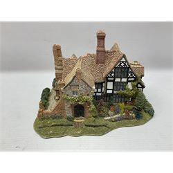 Three Lilliput lanes, comprising Oakwood Smithy, Anne of Cleves and Bluebell Farm, all with deeds and original boxes 