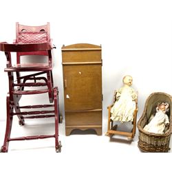 Maroon painted Edwardian high cum low chair, a further wood chair, doll clothes etc in miniature wardrobe, dolls wicker cot and two celluloid dolls