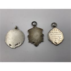 Ten early 20th century silver cartouche fobs, to include a Yorkshire Rose example, all hallmarked with various dates and makers
