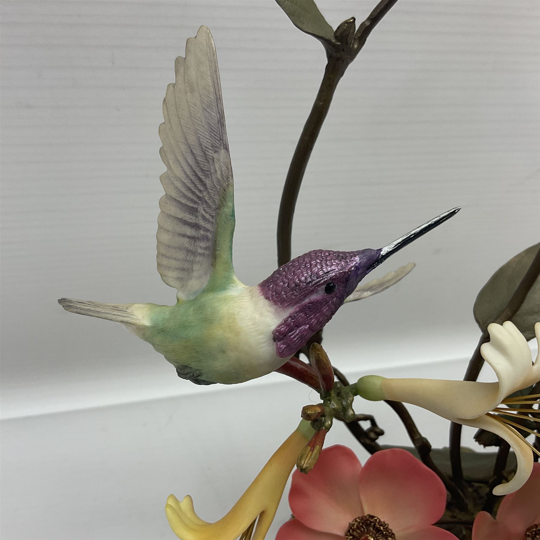 Franklin Mint House of Faberge, four humming bird figure groups, comprising Flight of Fancy, Beauty in Bloom, Splendor in the garden and The Enriched Garden, largest H35cm