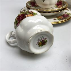Royal Albert Old Country Roses pattern tea service for six, comprising teapot, hot water pot, seven teacups, six saucers, six side plates, twin handled dish and jug and a Lady Carlyle cake plate