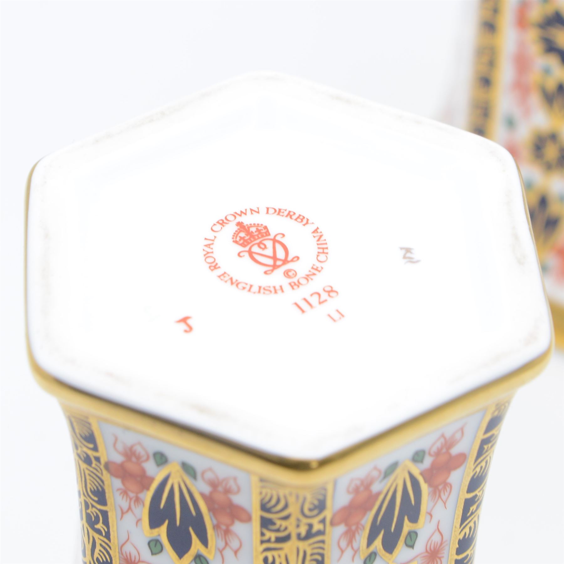Pair of Royal Crown Derby Imari 1128 pattern vases, of hexagonal form, with printed marks beneath including year cypher 2000, H12cm