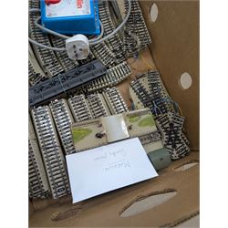 Marklin HO gauge model railway, comprising two Marklin H0 gauge locomotives, including electric DB class example and a steam locomotive, controller, tin plate track and rolling stock