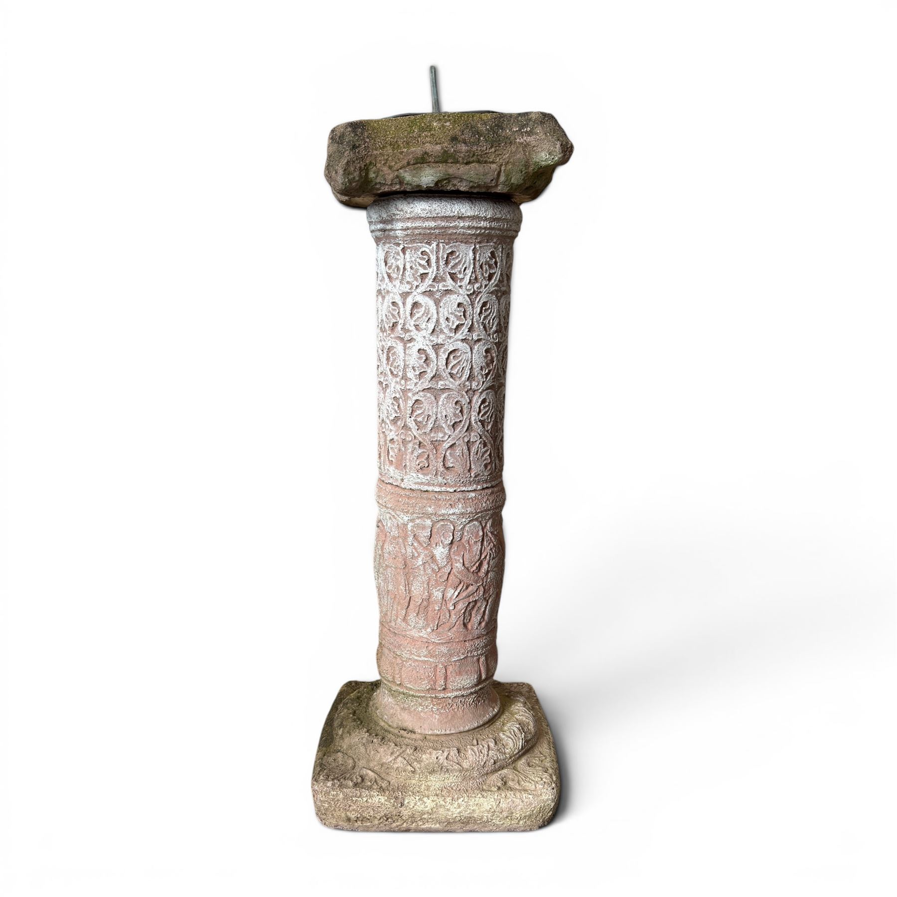 Weathered cast stone sundial, shaped top with metal dial, patterned column