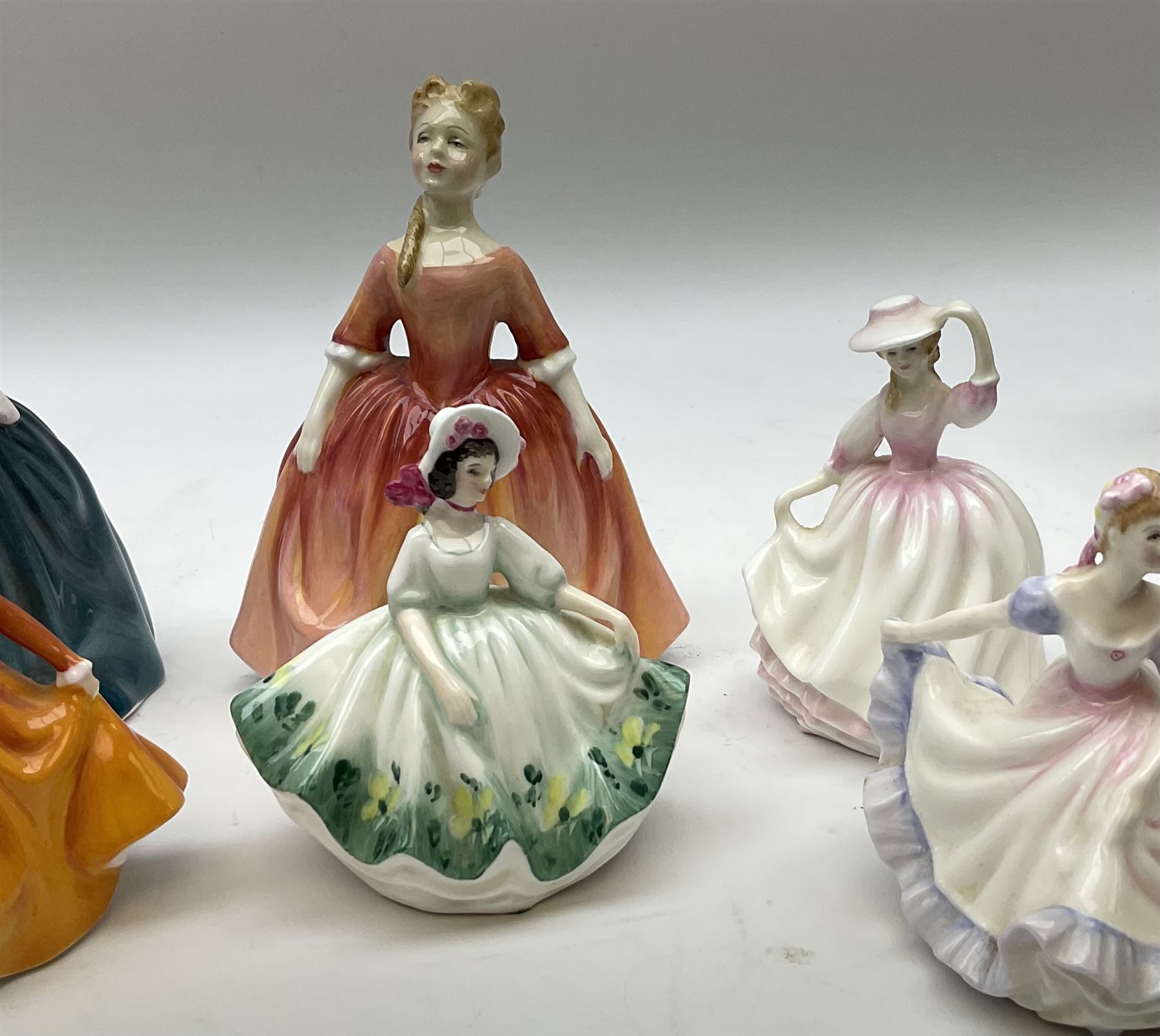 Royal Doulton Peggy Davies collection figures including Cherie HN2341, Debbie HN2400 and Royal Doulton miniature figures, Kirsty HN3213, Sunday Best HN3218, Sara HN3219, Ninette HN3215, Buttercup HN3908 and Fragrance HN3220.