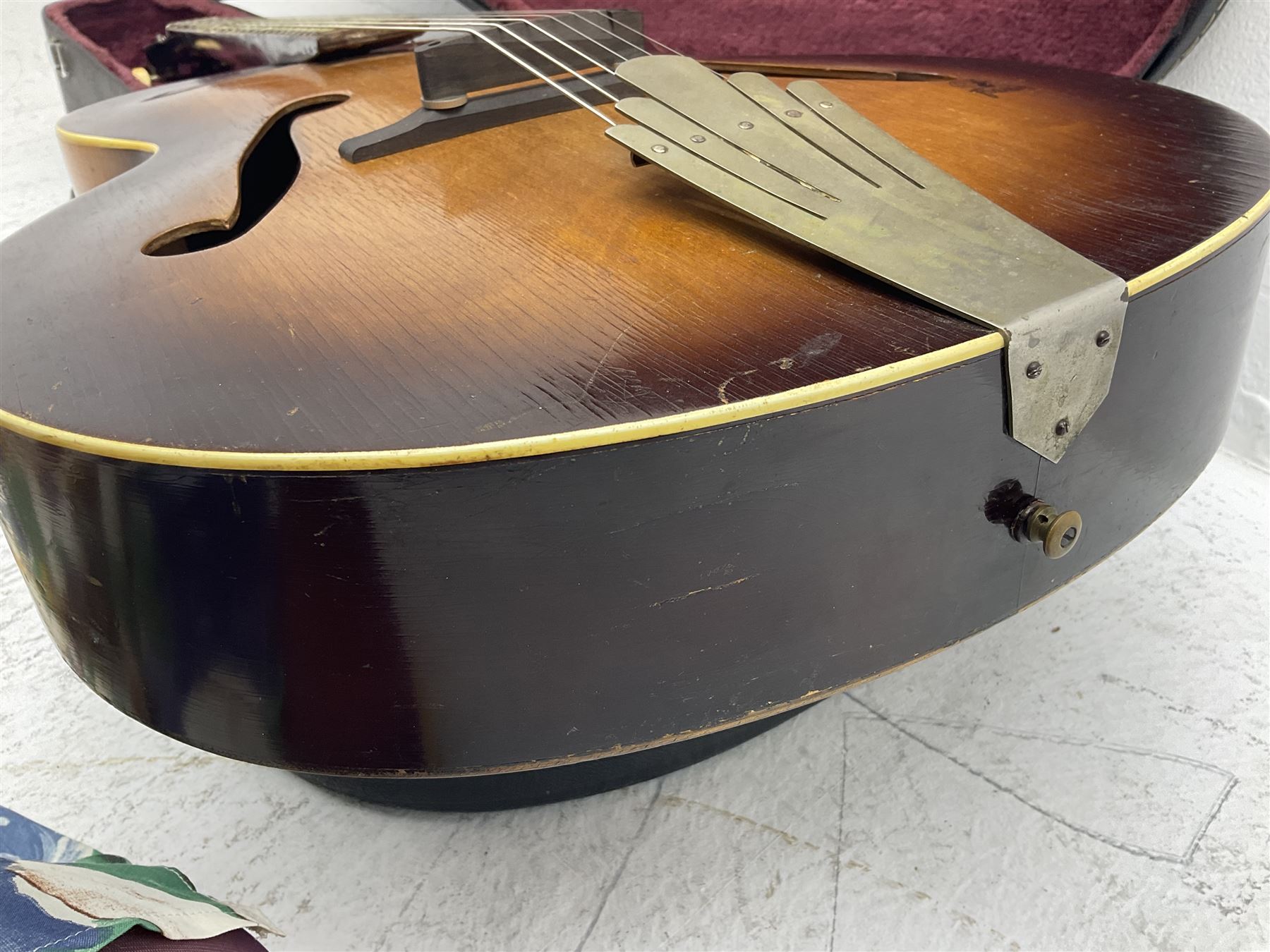 1950s Framus arch top acoustic guitar with sunburst finish and Framus logo to top, No.1937 L104cm; in hard carry case.