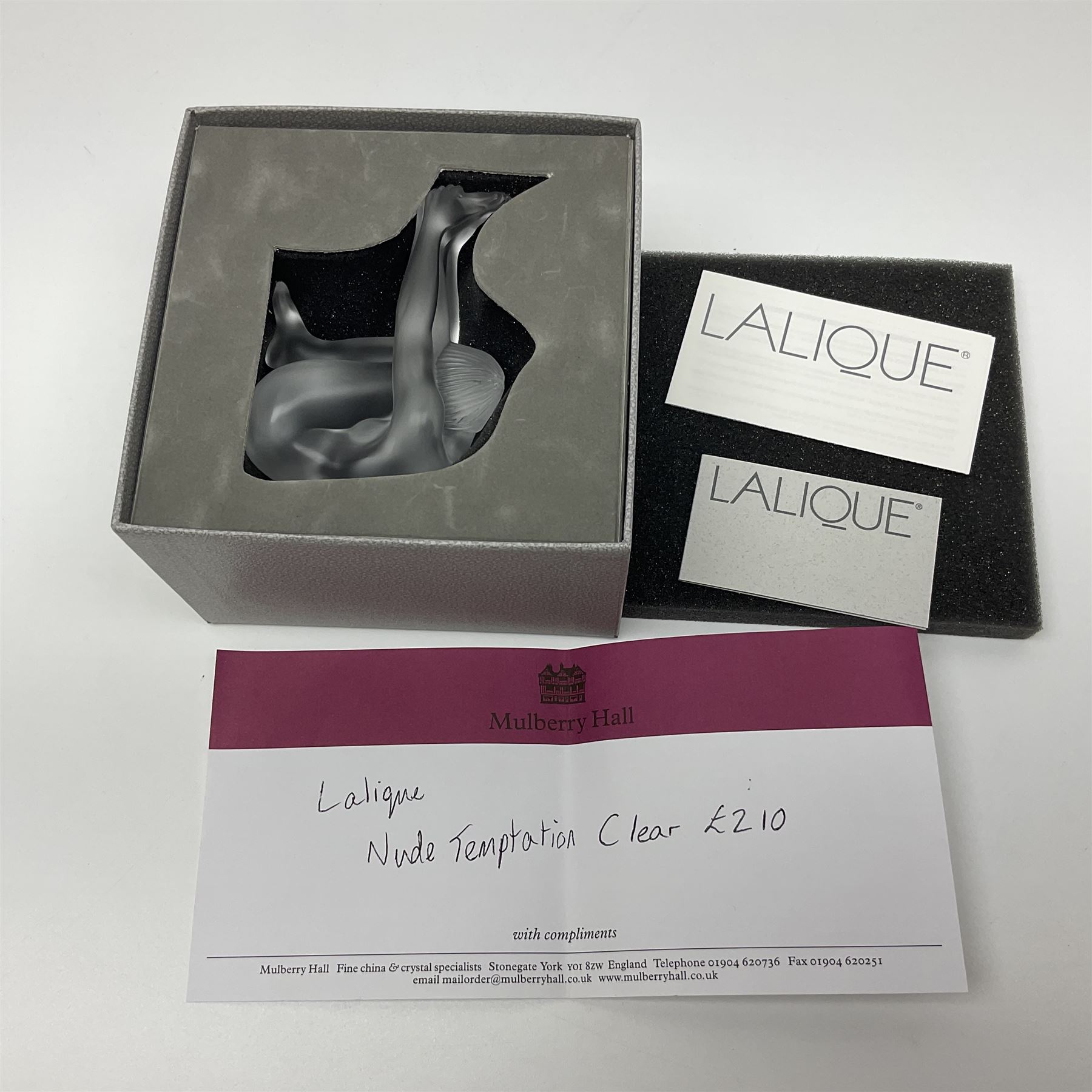 Lalique Nude Temptation, a frosted glass figure of a woman crouching with leg outstretched, in original box, H8cm