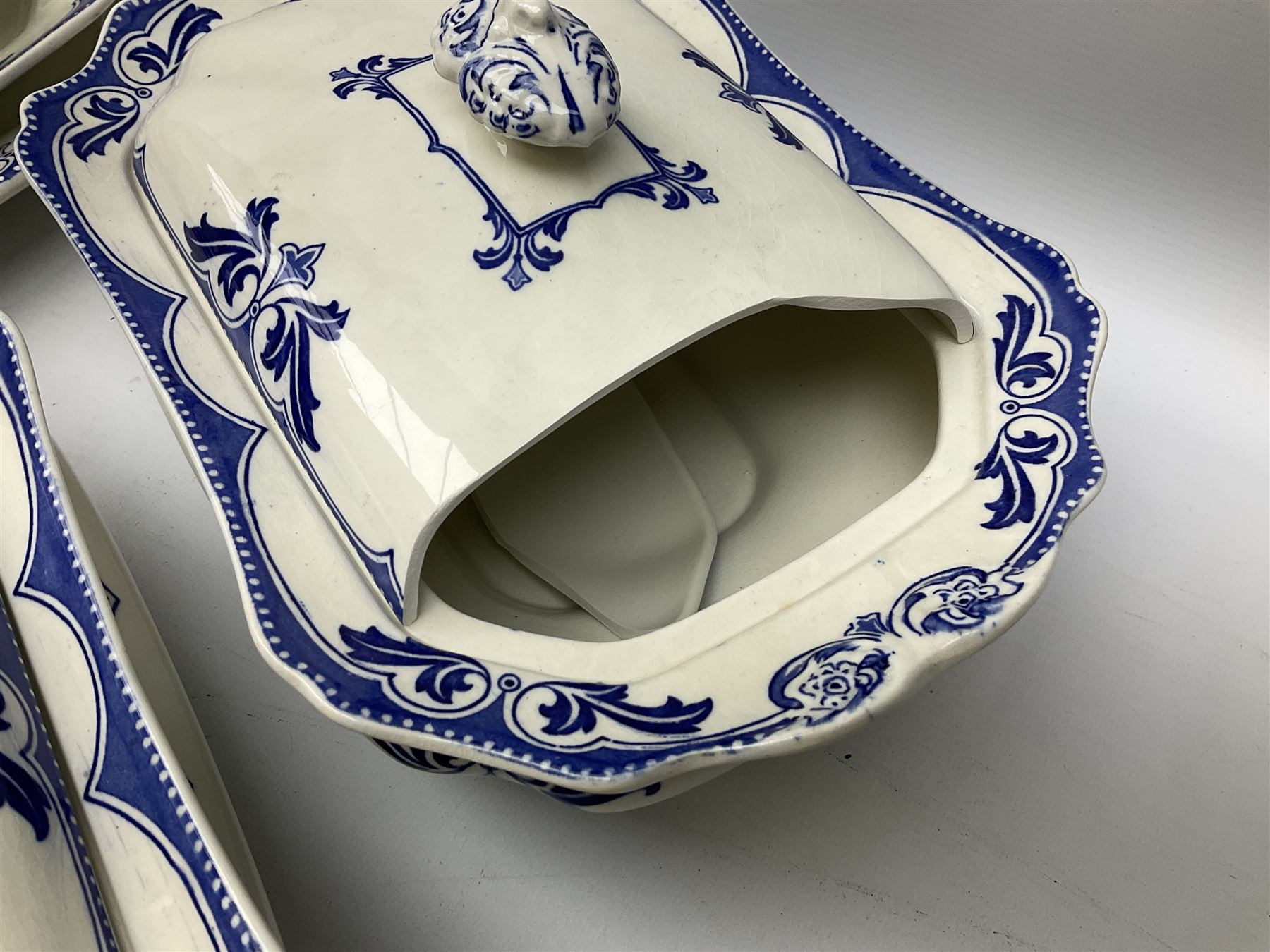 Burgess and Leigh Middleport pottery dinner wares decorated in the ‘Milford’ pattern, to include lidded tureens, graduated meat plates, dinner plates etc 