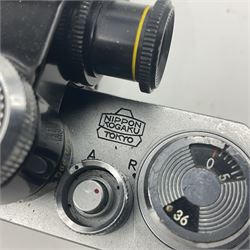 Nikon F Photomic NKJ camera body, marked 'US Dept of Defense ... U.S.A.F DA Nang, serial no. 6561811, with 'Nippon Kogaku NIKKOR-P Auto 1:2.5 f=105mm' lens, serial no. 212154