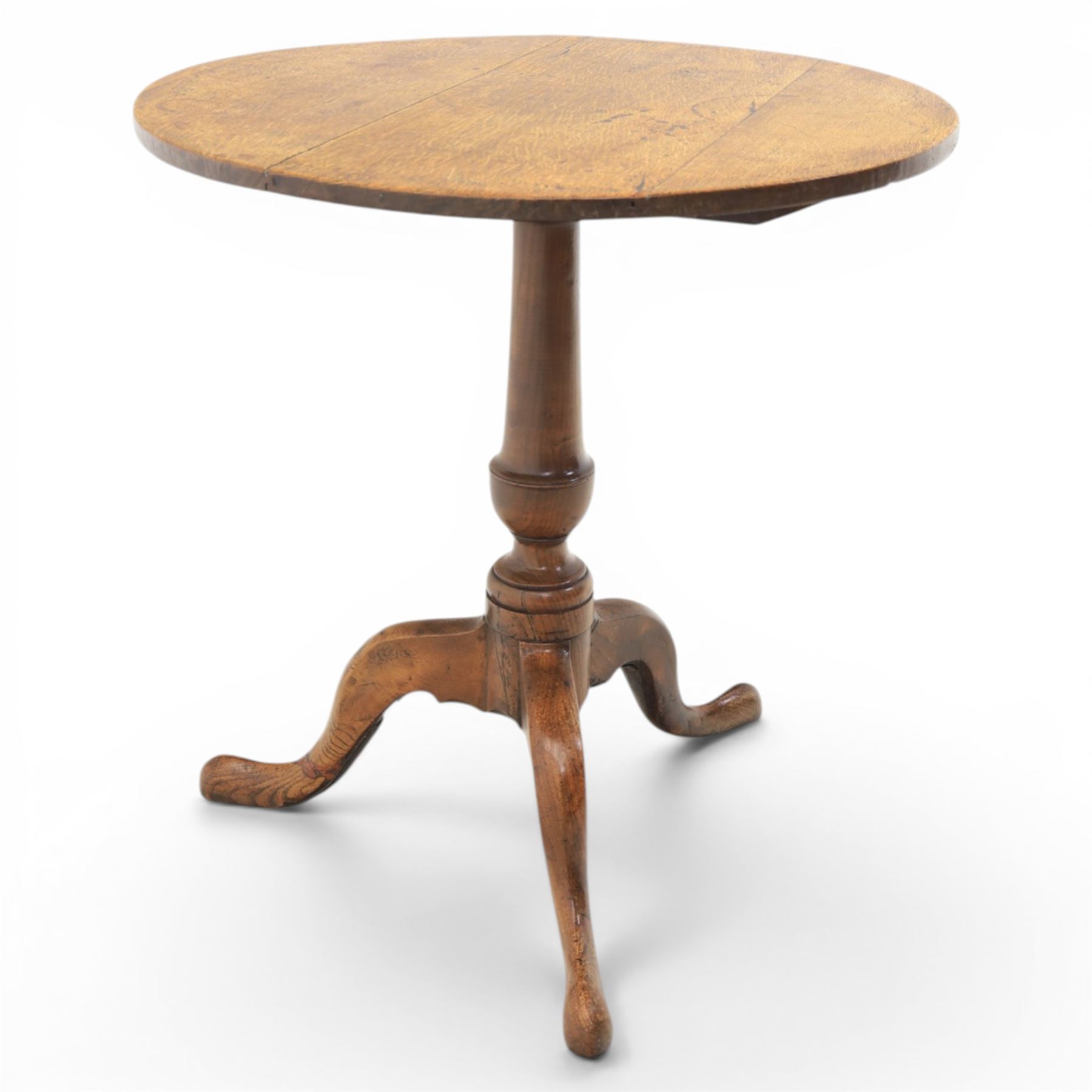 Georgian oak tripod table, plank top raised on a turned baluster column, raised on cabriole supports 